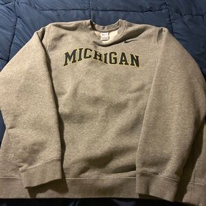 Men's Nike University of Michigan crewneck sweatshirt.